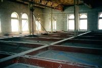 The unrestored ballroom above the dining room